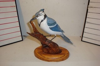 Original signed blue jay wood hand carved bird w/wood stand signed dated 1994