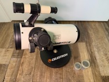 Telescopio de mesa Celestron Cometron FirstScope 76 76 mm 21023 con oculares