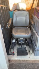 Electric Wheelchair Pronto M51 with surestep with trailer hitch trailer. 