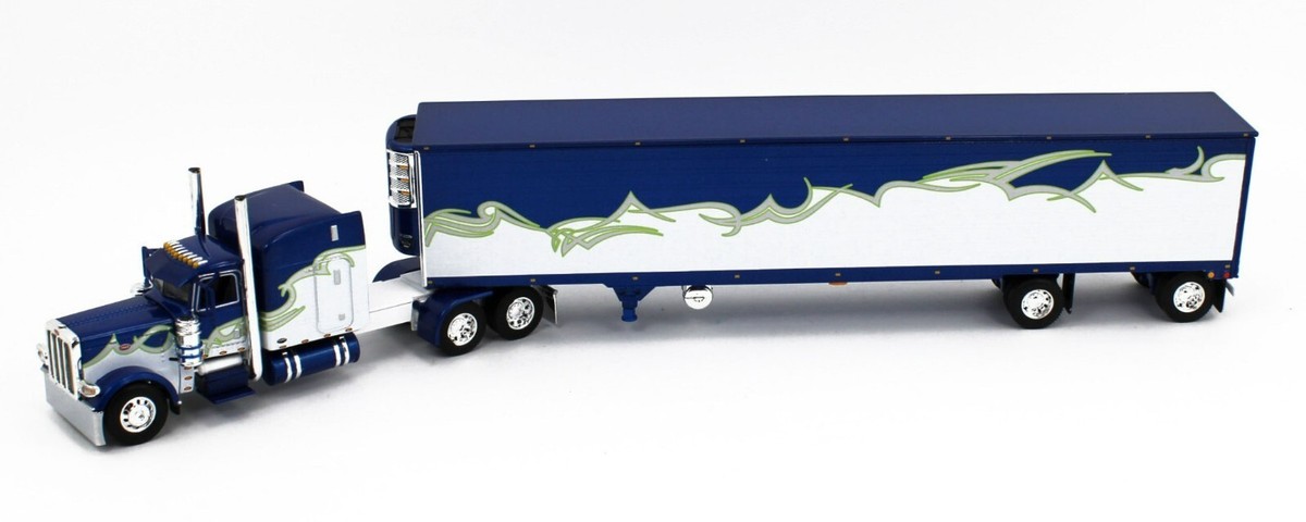 DCP ダイキャストプロモーション 1/64 PETERBILT 389 Amazon.com: DCP 1/64 Blue, Silver & Lime Peterbilt 389 63