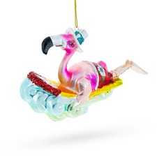 Pink Flamingo Riding a Surf Wave Glass Ornament