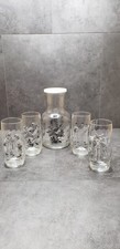 Norman Rockwell Drinking Glasses and Pitcher 