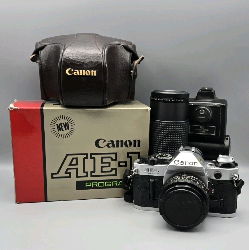 Canon AE-1 Program 35mm SLR Film Camera with 50mm Lens Kit, Case