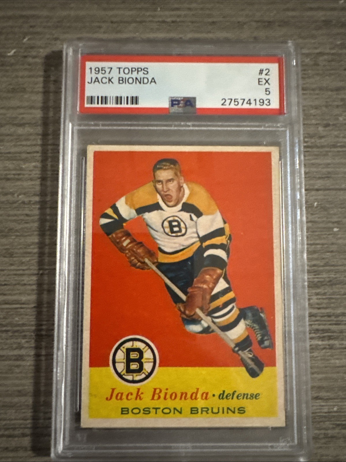 Jack Bionda #2 Hockey Cards 1957 Topps trading card — raw and PSA graded price guide