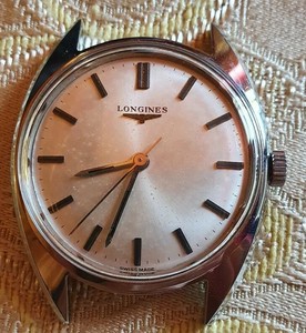 old longines watch value