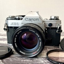 Canon AE-1 SLR 35mm Film Camera w/ Canon Lens FD 50mm F1.4 s.s.c. From Japan