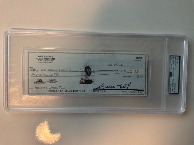 Willie Mays autographed check from home account (PSA/DNA Gem Mint 10).