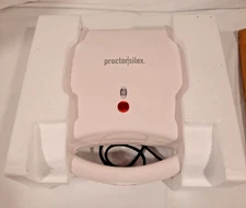 PROCTOR SILEX SANDWICH TOASTER NONSTICK SURFACES. STORES UPRIGHT. NOT USED