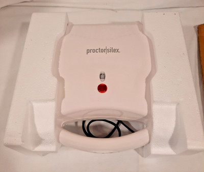 PROCTOR SILEX SANDWICH TOASTER NONSTICK SURFACES. STORES UPRIGHT. NOT USED