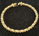 in X Pattern 7.25 inch Gold Plated Cz Tennis Bracelet