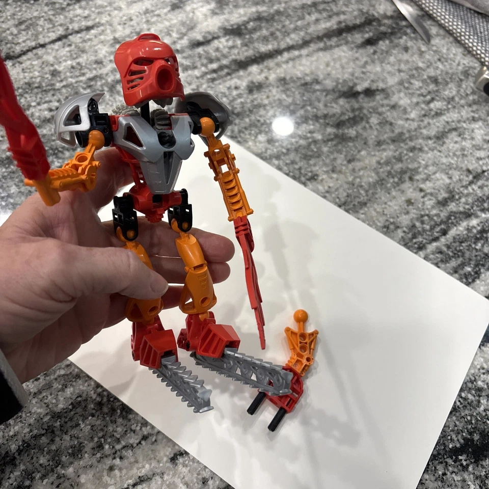 LEGO BIONICLE: Tahu (8534) pieces to make 8566 Read - Image 2 of 4