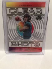 2021 ILLUSIONS FOOTBALL TREVOR LAWRENCE CLEAR SHOTS BASE RC JAGUARS CARD #CS-16