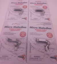Micro Melodies Worlds Tiniest Harmonica - New Lot Of 4 . CAB