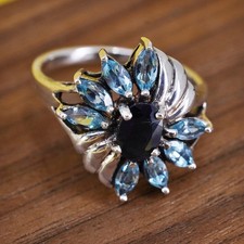 Size 8.25, vintage Sterling 925 silver floral ring with blue topaz