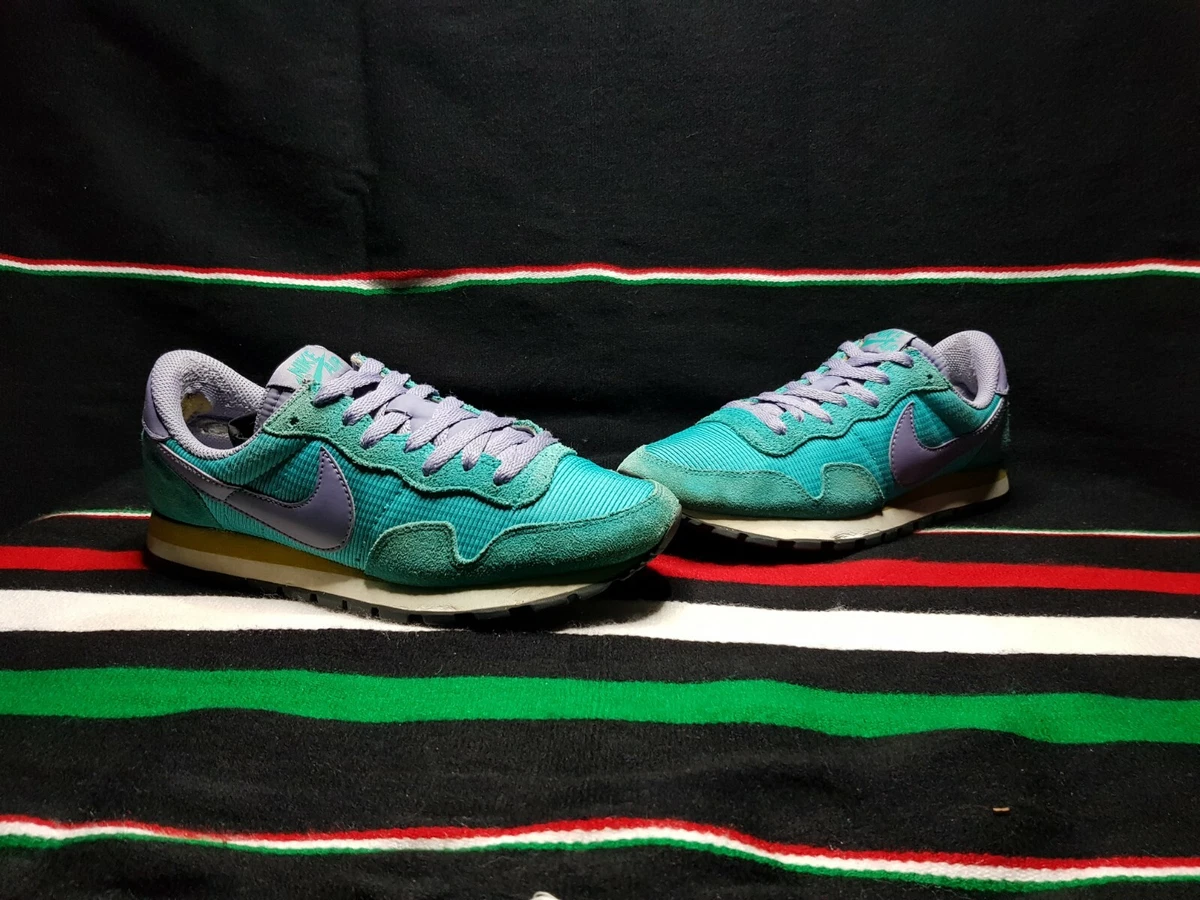 Purple and hotsell turquoise nikes