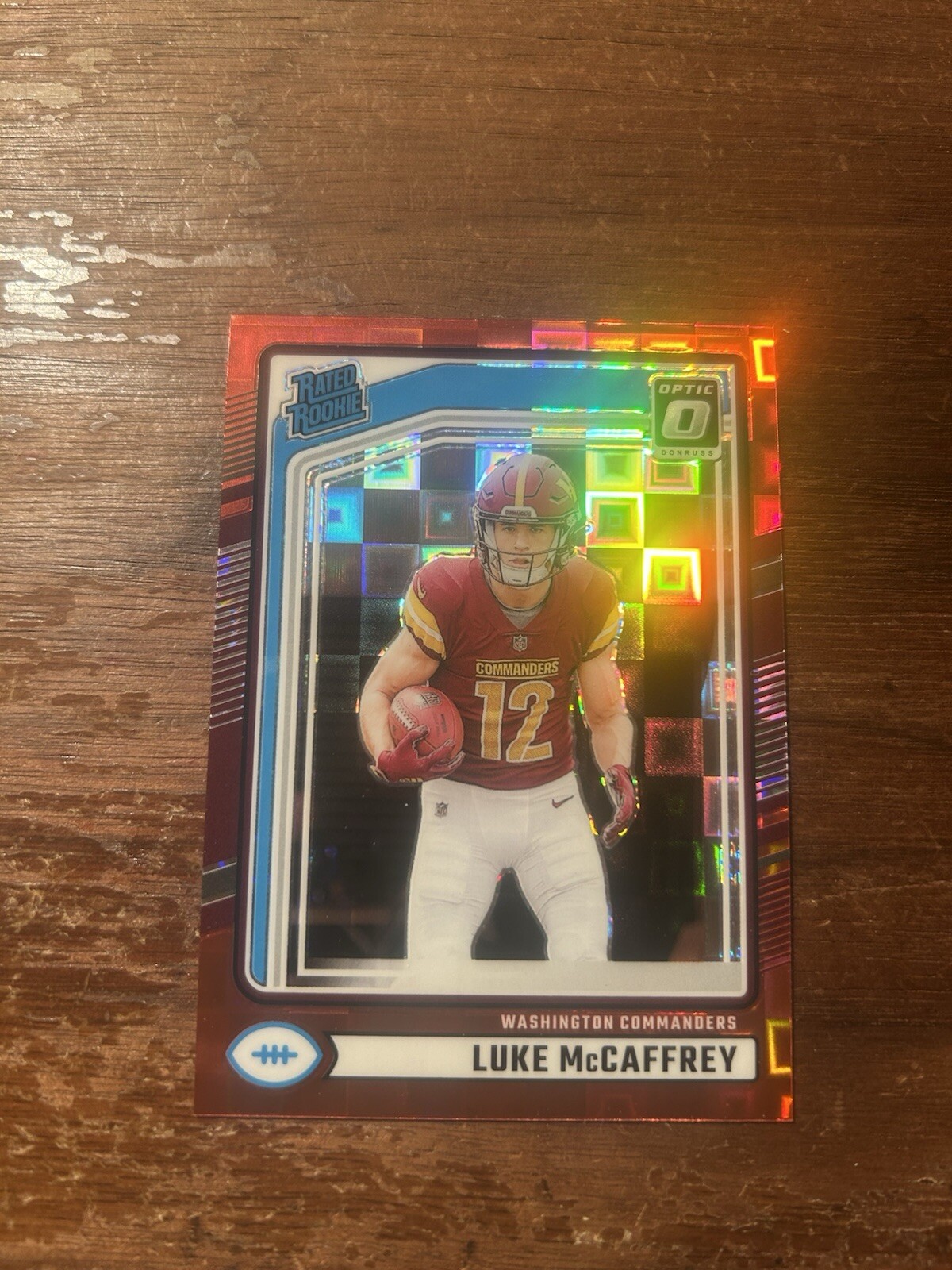 Luke McCaffrey Panini Donruss #302 Optic Preview-Red Pandora