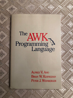 The Awk Programming Language  by Alfred Aho