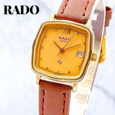 Reloj de cuarzo cuadrado para dama Rado esfera dorada fecha conjunto de piedras vintage Japón