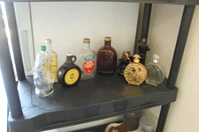 10 Collector Bottles - Avon, Little Brown Jug; Log Cabin; Mennen; Watkins