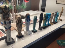 Collection of 13 Egyptian ancient statuary all recreations 7 in to 12 in