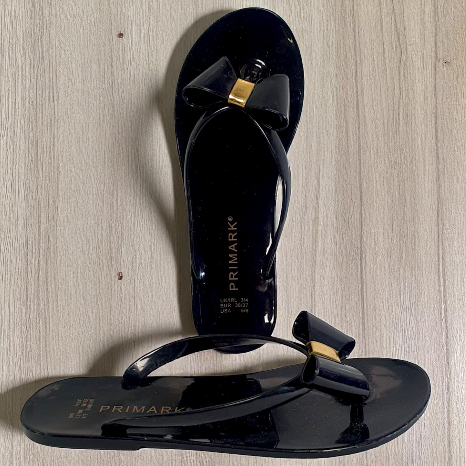 PANTOFOLA D’ORO Sandali donna Primark neri infradito gelatina fiocco oro estate spiaggia ciabatte UK