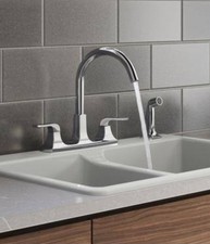 Rubicon R26582-CP Two-handle kitchen faucet with sidespray in Polished Chrome 