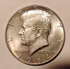 (A)     1964 KENNEDY HALF DOLLAR.....AU / BU?