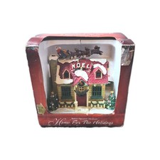 Home for the holidays light up musical house