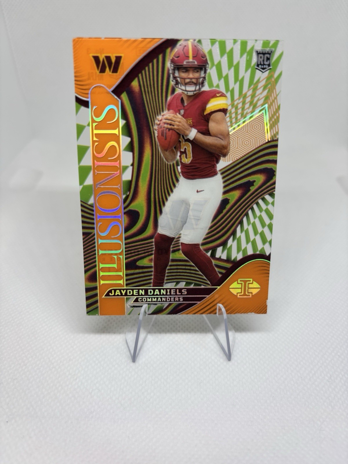 2024 Panini Illusions - Illusionists Jayden Daniels #3 Orange (RC)