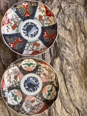 Antique Japanese Imari Porcelain Plates with Floral and Geometric Designs