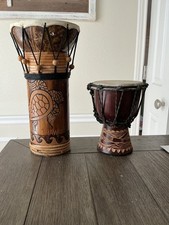 Two African Djembe Drums. Used. Approximately 13 x 6 and 7 1/2 x 6