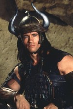 Poster Conan Il Barbaro Arnold Schwarzenegger che indossa l'elmetto con le corna 18x24
