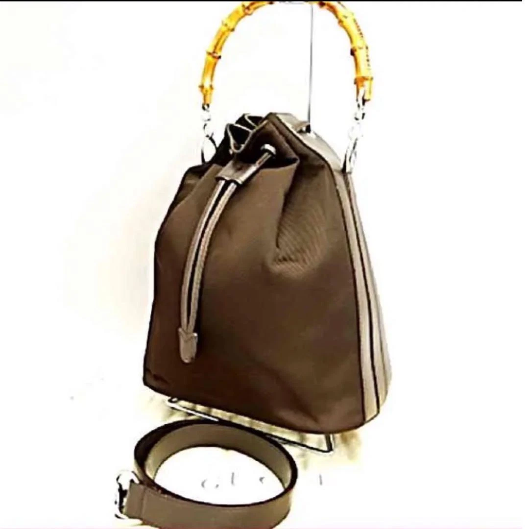 Sac bandoulière GUCCI marron thé 2 voies état d'usage