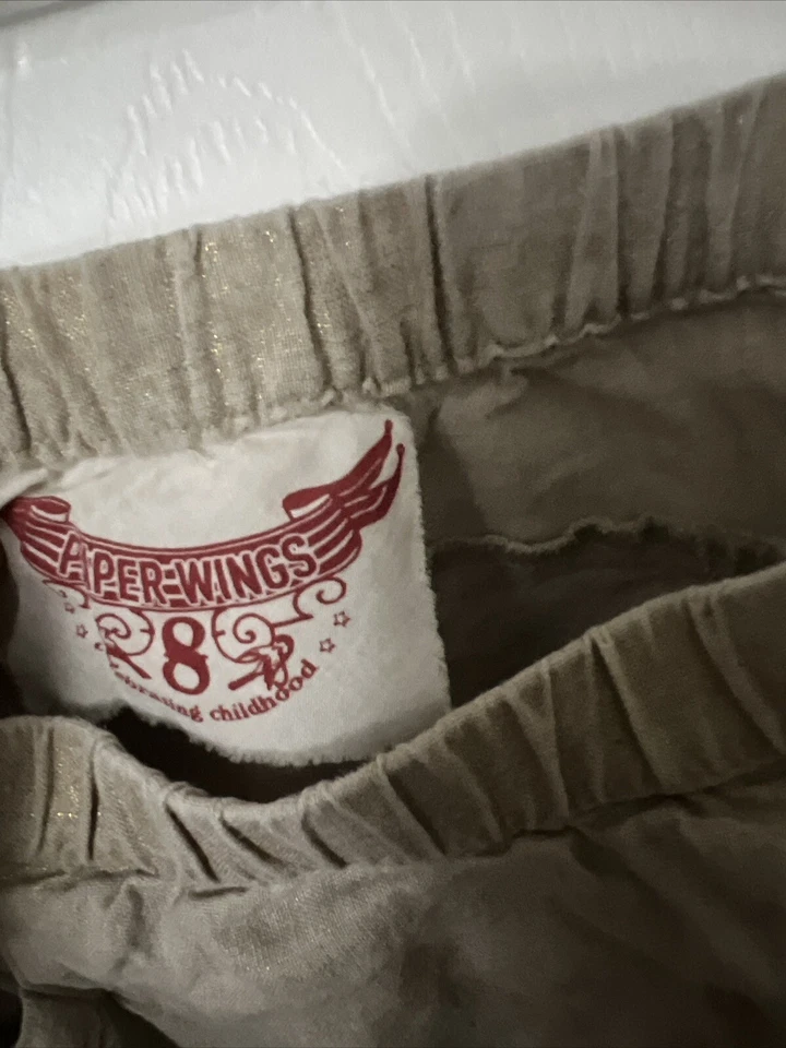 Linda falda gris con volantes y dos bolsillos con alas de papel para niña talla 8 Foto 3 de 4