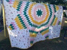 Vintage Handmade Lone Star Quilt with Floral Design