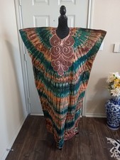 African Dress Size L - XL , Bust 48inch, Hip 54 inch  Length 52inch