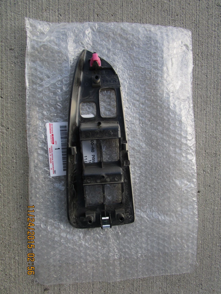 03-09 LEXUS GX470 LADO DEL CONDUCTOR MAESTRO INTERRUPTOR VENTANA ELÉCTRICA BISEL EMBELLECEDOR BRONCEADO FABRICANTE DE EQUIPOS ORIGINALES NUEVO Foto 2 de 2