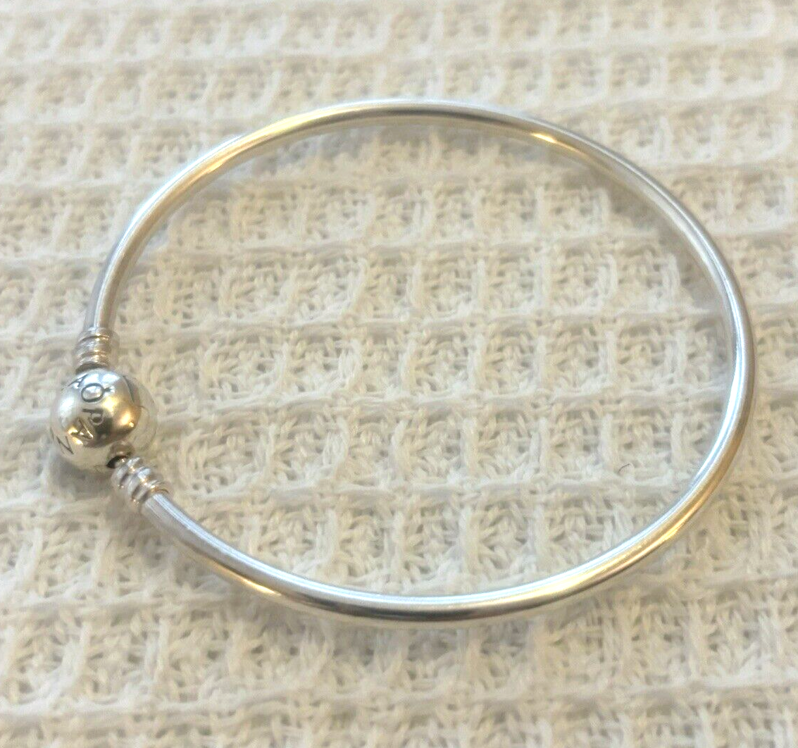 Pandora 925 sterling silver bangle charm bracelet in nice condition-image