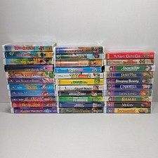 Lot of 32 Disney VHS Tapes Clamshell Cases Animated Classics Rare  Collectible