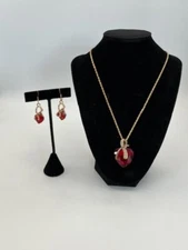 Red crystal heart pendant necklace and earring set with clear crystals