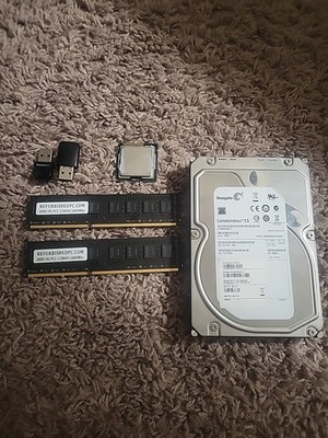 I5 2400 cpu, 2 sticks ddr3 ram, 2tb seagate drive, and wifi + bluetooth dongles.