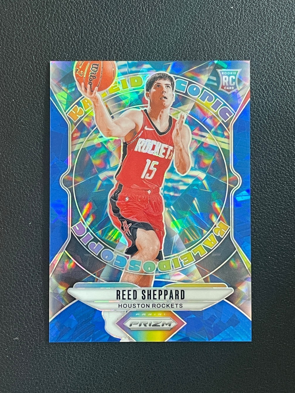 Reed Sheppard 2024-25 Panini Prizm RC Kaleidoscopic Blue Ice Prizm 094/125 #24