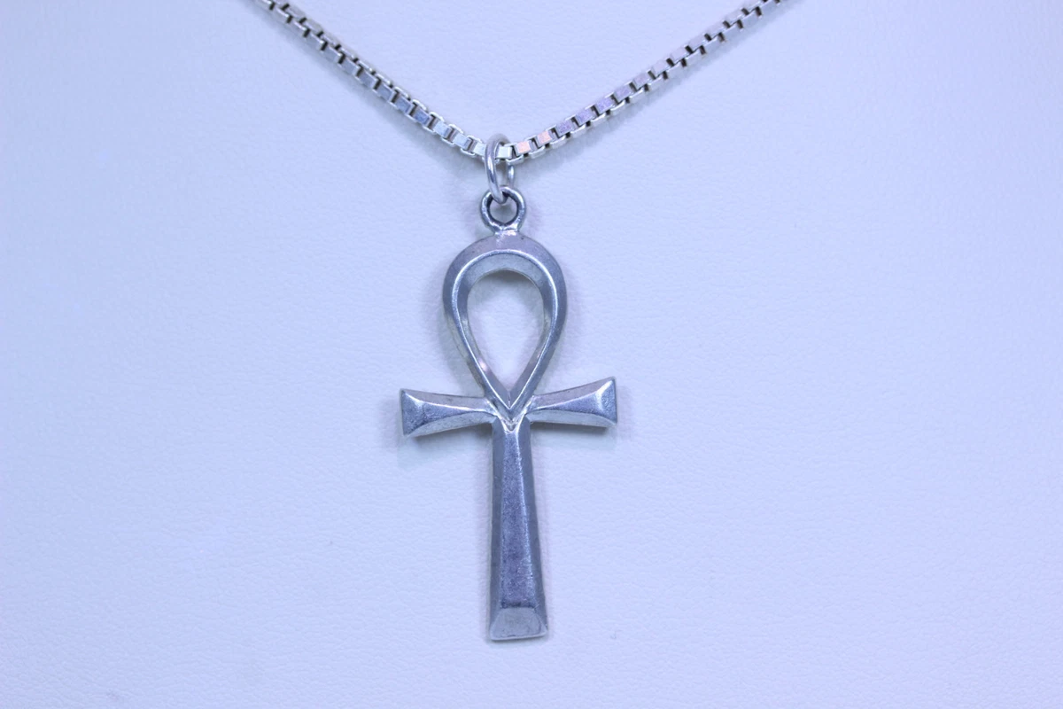 Cross necklace with loop on best sale top