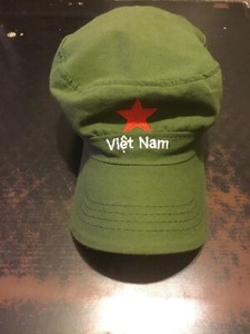 green hat with red star