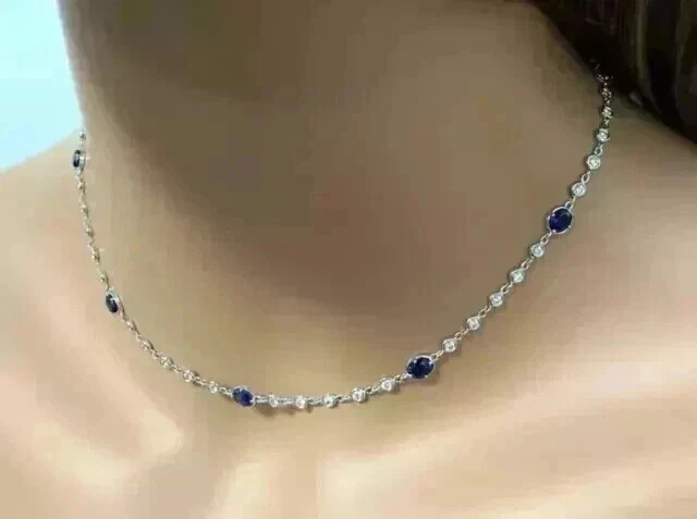 Collar tenis zafiro azul creado en laboratorio corte ovalado de 10,00 quilates enchapado en oro blanco de 14 quilates Foto 3 de 4