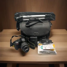 Nikon D3200 Digital SLR Camera w/18-55mm Lens and Camera Bag Charger Tripod