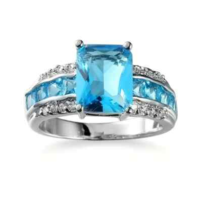 Fashionable Four Prong Set Aquamarine & White Cubic Zirconia Anniversary Ring