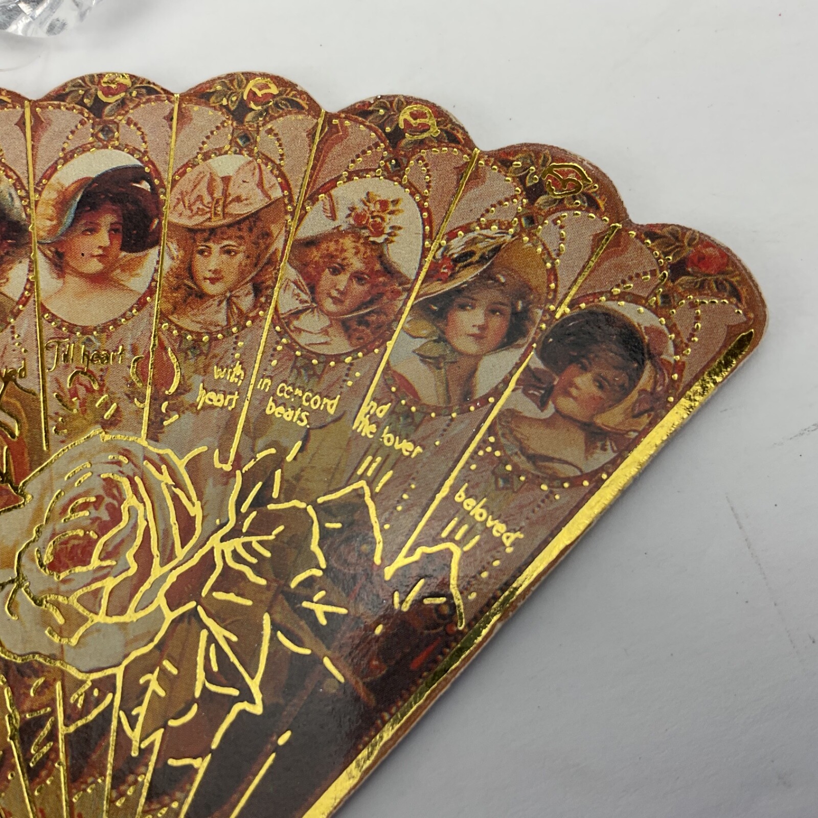die cut paperboard victorian ornament gold accents Victorian girls on
