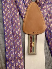 Trafalgar suspenders featuring a geometric purple silk pattern