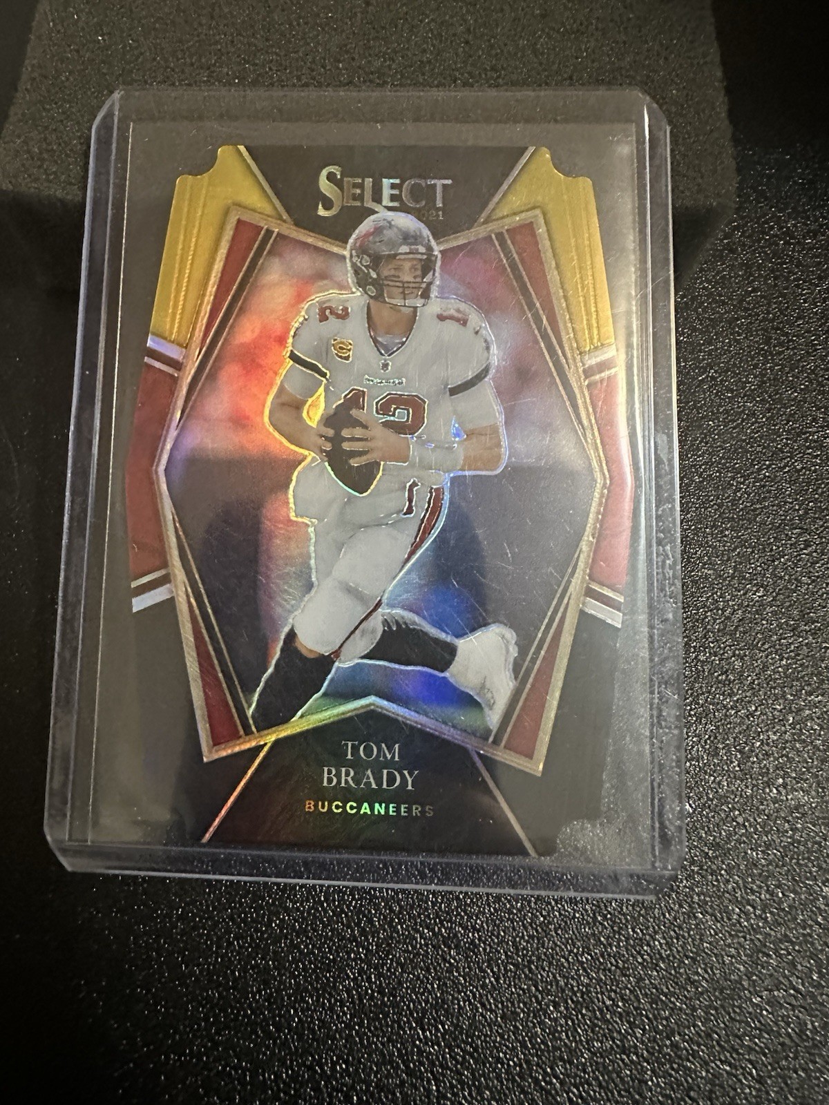 2021 Panini Select - Premier Level Tom Brady #101 Black & Gold Prizm Die-Cut